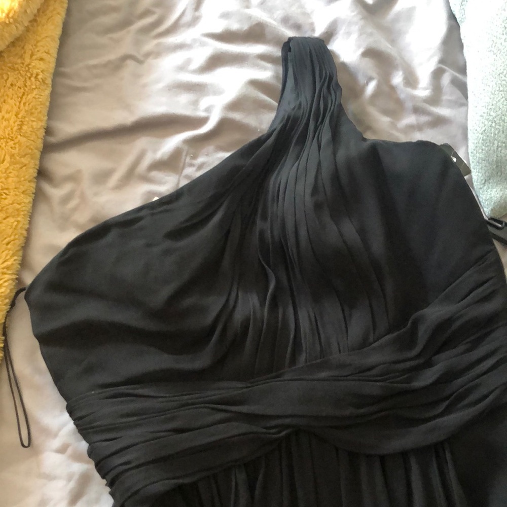 Dramatic one shoulder designer gown with slight train